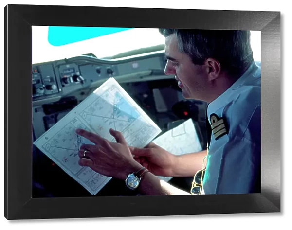 Pilot looking at map