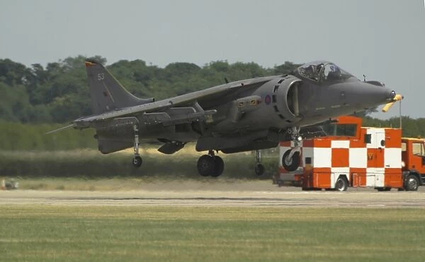 im-581. A Harrier GR-7A from 20 (R) Sqn RAF Wittering landing after its