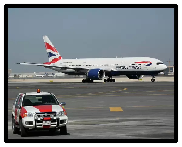 Boeing 777-200 British Airways at Dubai airport with ramp vehicle