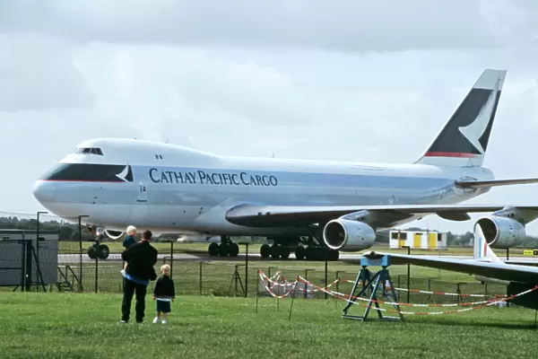 Boeing 747-200F Cathay Pacific Cargo being watched by family