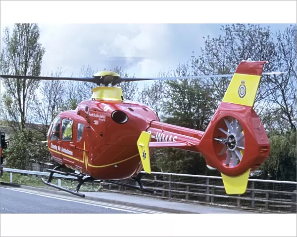 Air Ambulance landing on road after accident