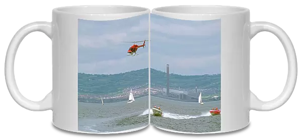 Helicopter being used to film power boat race