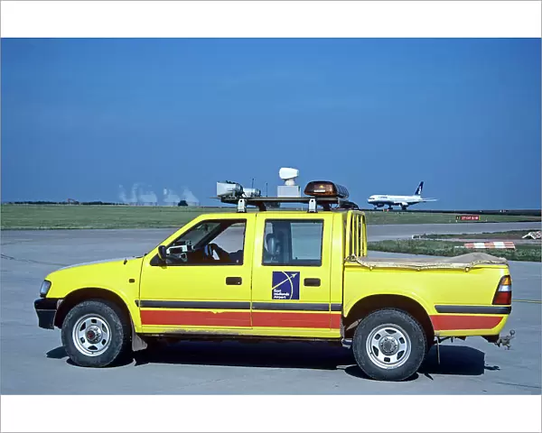 Bird Scaring vehicle on runway at East Midlands Airport UK