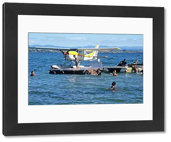 Cessna seaplane on pontoon on Lake Taupo, New Zealand