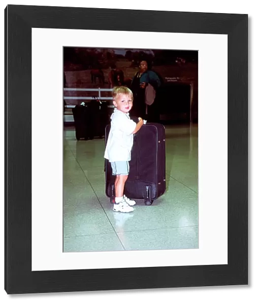 Small boy big suitcase