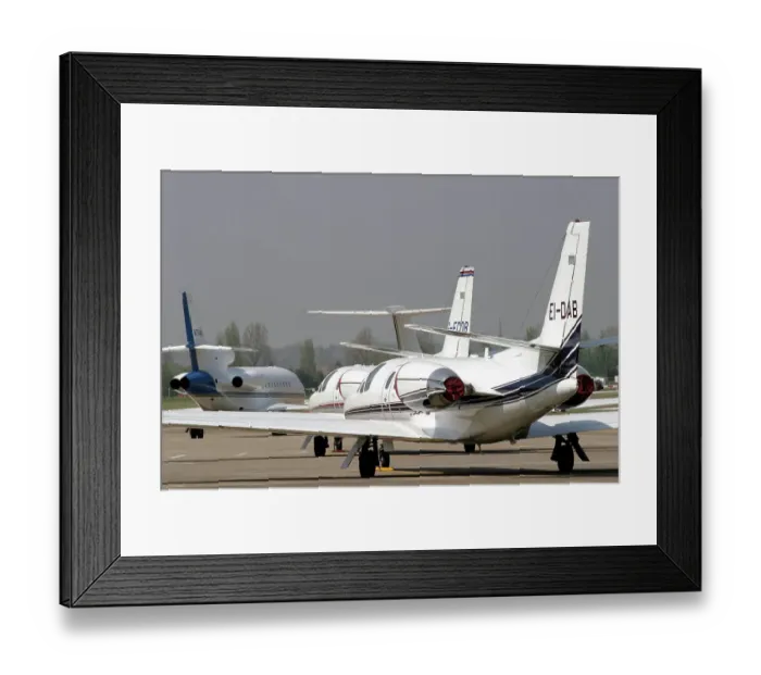 Framed Print : Citations. Two Eurojet Citations in line abreast on BHX ramp - includes Chris de Burgh s Framed Print : Citations. Two Eurojet Citations in line abreast on BHX ramp - includes Chris de Burgh s
