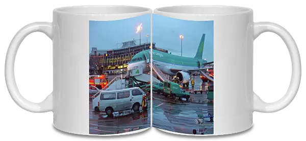Airbus A320 Aer Lingus at Dubin Airport with evacuation slides deployed and fire service