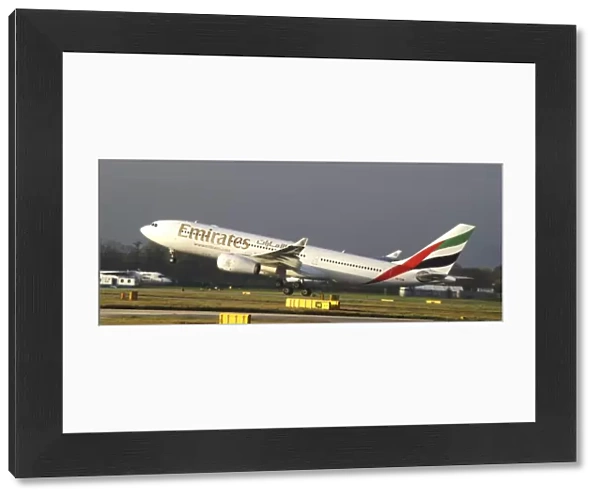 Emirates;A330;rotate;arabic logo;wheels still down;take off