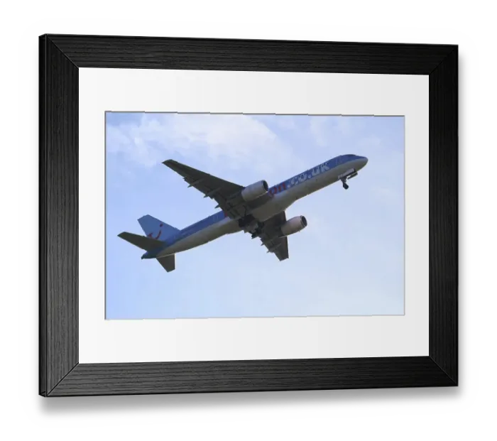 Framed Print : IML 041. thompson 757 -takeoff at ema-gear up Framed Print : IML 041. thompson 757 -takeoff at ema-gear up