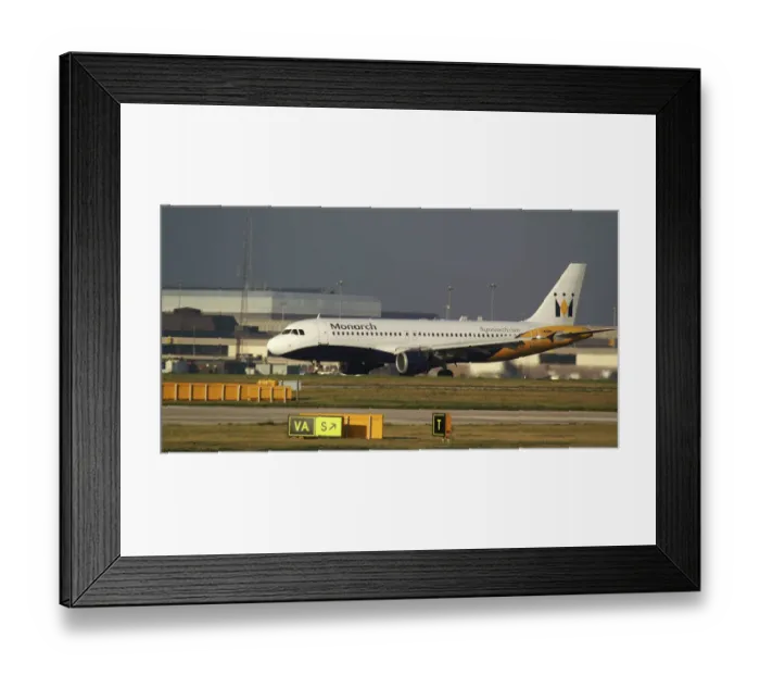 Framed Print : Monarch;A320;British charter airline;slowing down;reverse thrust Framed Print : Monarch;A320;British charter airline;slowing down;reverse thrust
