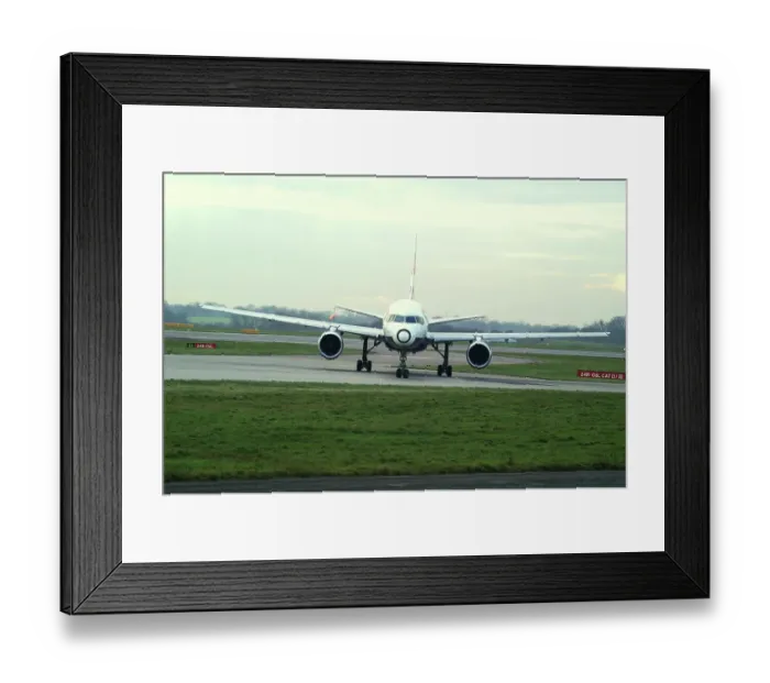 Framed Print : black nose;circular nose; painted nose;B757;taxing; manchester Framed Print : black nose;circular nose; painted nose;B757;taxing; manchester