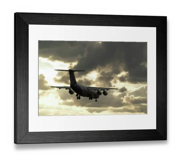 Framed Print : BAe 146 Brussels landing in sunset
