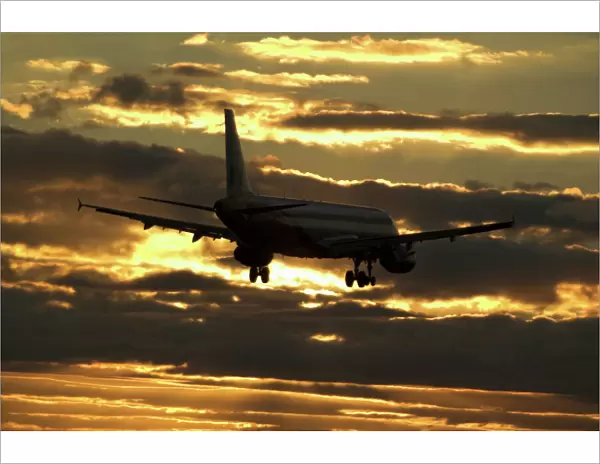 Airbus A320 Monarch in sunset