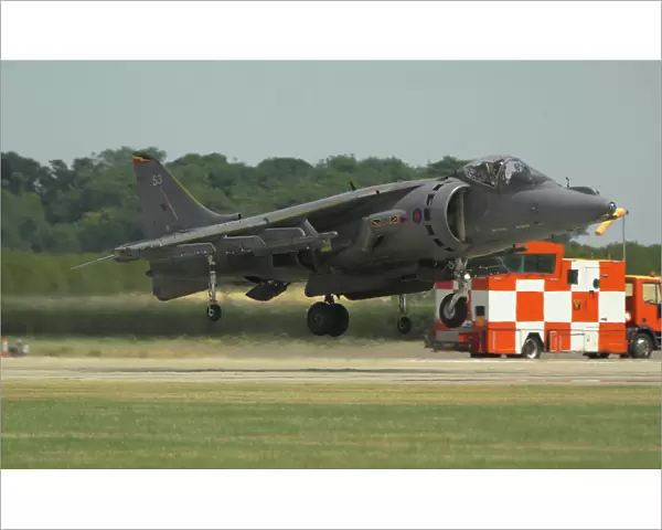 im-581. A Harrier GR-7A from 20 (R) Sqn RAF Wittering landing after its