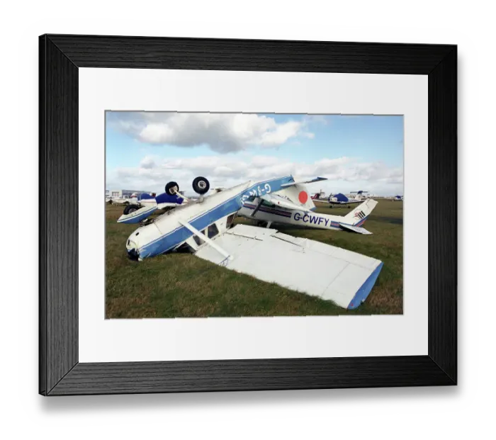 Framed Print : Storm Damage on Cessna 150