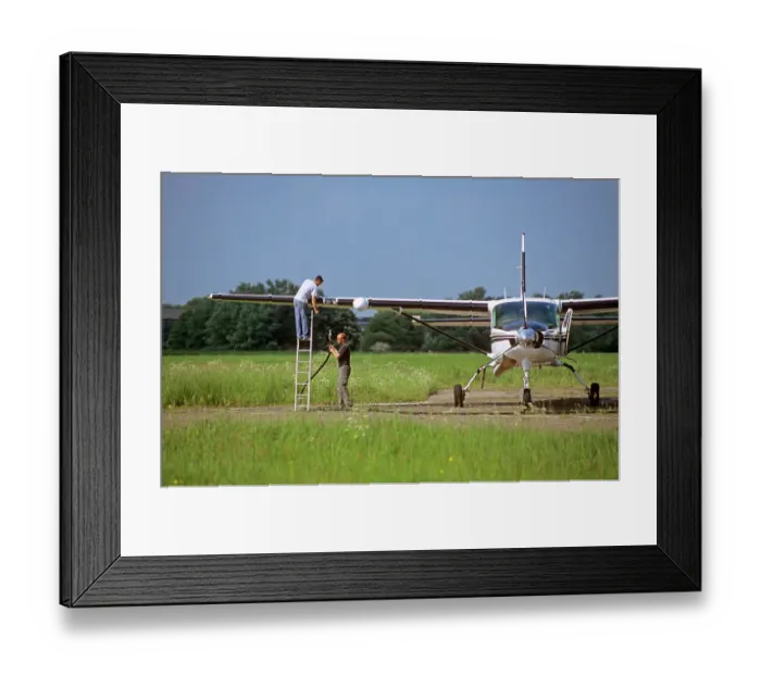 Framed Print : randall cessna 208b grand caravan being refuelled