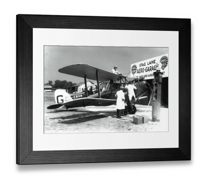 Framed Print : DH Gypsy Moth refuelling at Stag Lane aerodrome Framed Print : DH Gypsy Moth refuelling at Stag Lane aerodrome