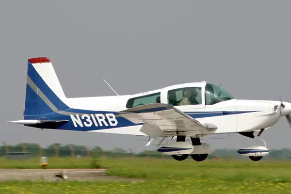N31RB. Grumman a5 just about to touchdown at Kemble
