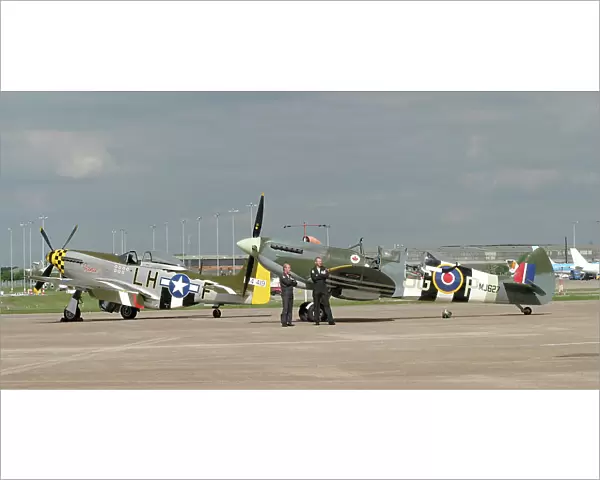 Fighters. P-51 9G-MSTG) and B of B two seat Spitfire at BHX May 2003 for