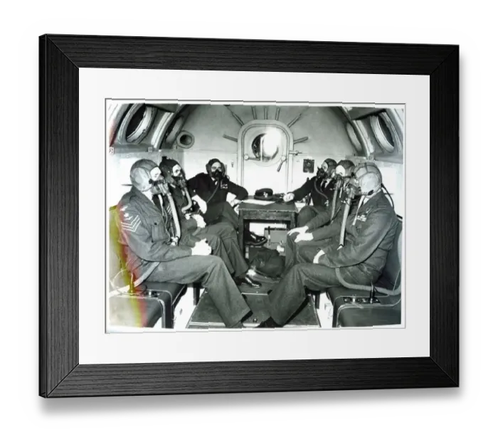 : Crew and officers wear oxygen masks during a flight on a Vickers Valiant : Crew and officers wear oxygen masks during a flight on a Vickers Valiant