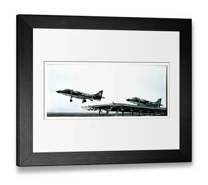 : Sea Harriers launch from the deck of an aircraft carrier : Sea Harriers launch from the deck of an aircraft carrier