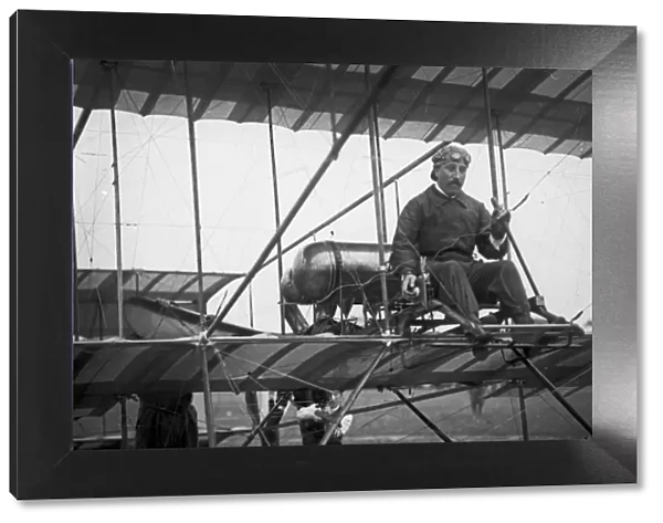 Belgian aviator, Joseph Christianes on his Henry Farman biplane