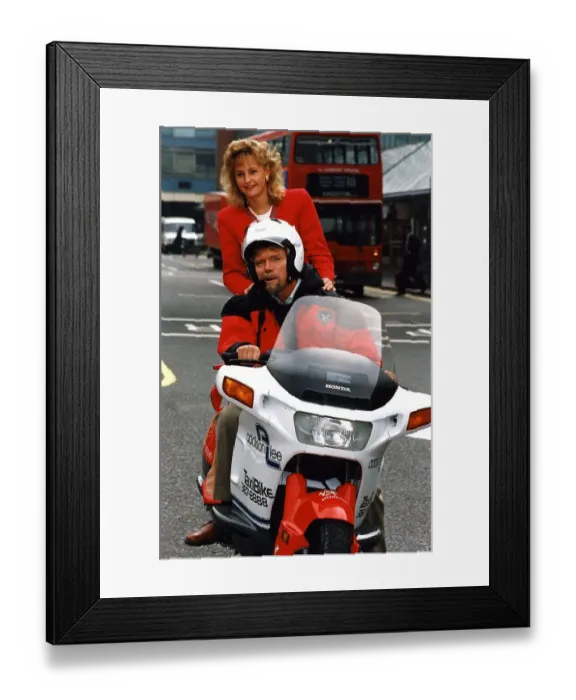 Framed Print : Richard Branson tries out his new motor cycle chauffeur service Framed Print : Richard Branson tries out his new motor cycle chauffeur service