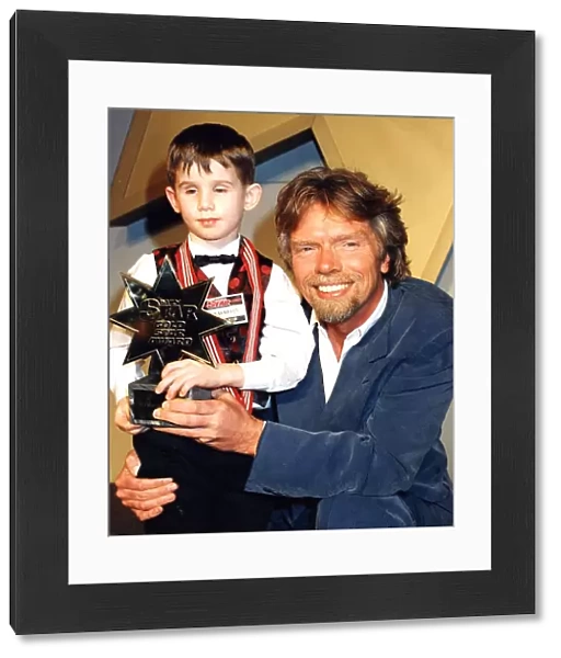 Richard Branson and Daily Star Gold award winner seven year old Nicholas Killen