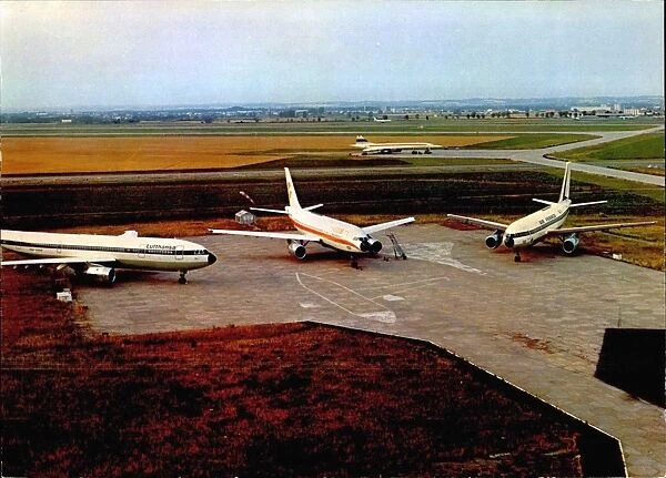 Three Airbus A300 static on the runway
