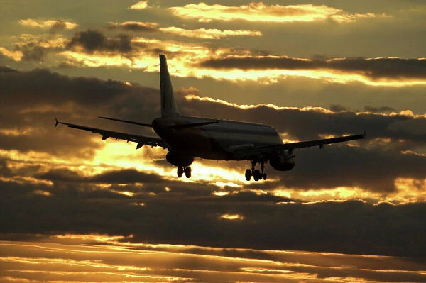 Airbus A320 Monarch in sunset