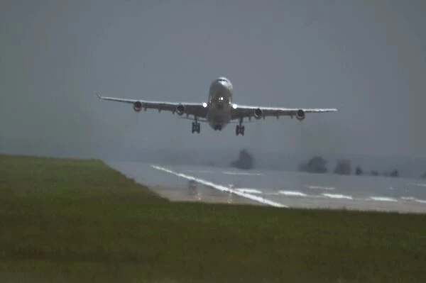 Airbus A340-300 taking off from East Midlands on a hot day