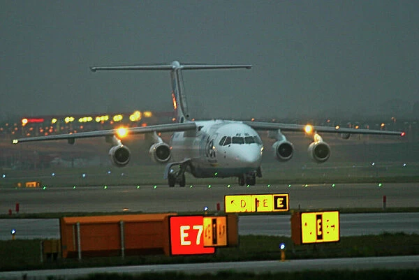 Avro RJ Flybe dawn at Birmingham Airport UK
