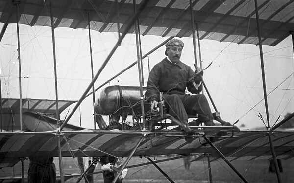 Belgian aviator, Joseph Christianes on his Henry Farman biplane
