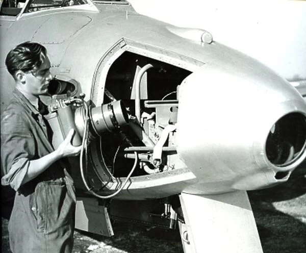 Camera being removed from an RAF Meteor FR9 aircraft 1951