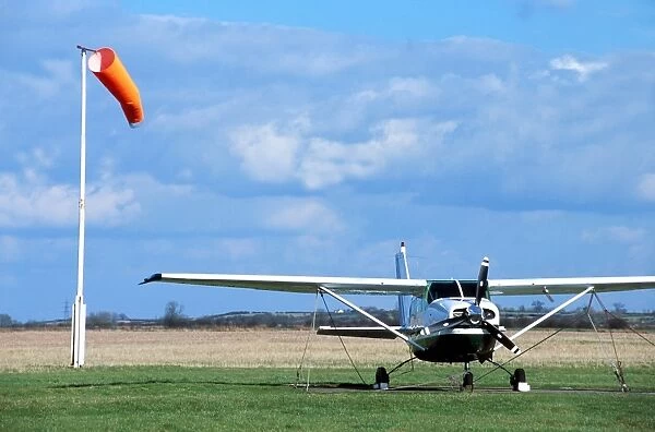 Cessna 206 and windsock