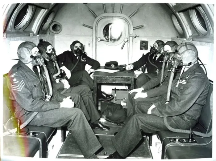 : Crew and officers wear oxygen masks during a flight on a Vickers Valiant : Crew and officers wear oxygen masks during a flight on a Vickers Valiant
