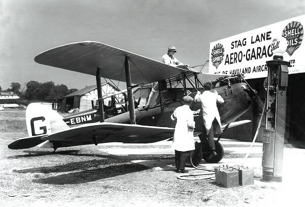 DH Gypsy Moth refuelling at Stag Lane aerodrome
