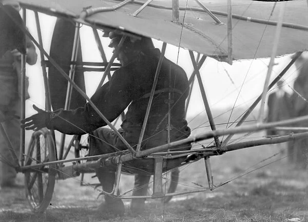 Edmond Audemars under his high-wing, wire-braced French Demoiselle monoplane
