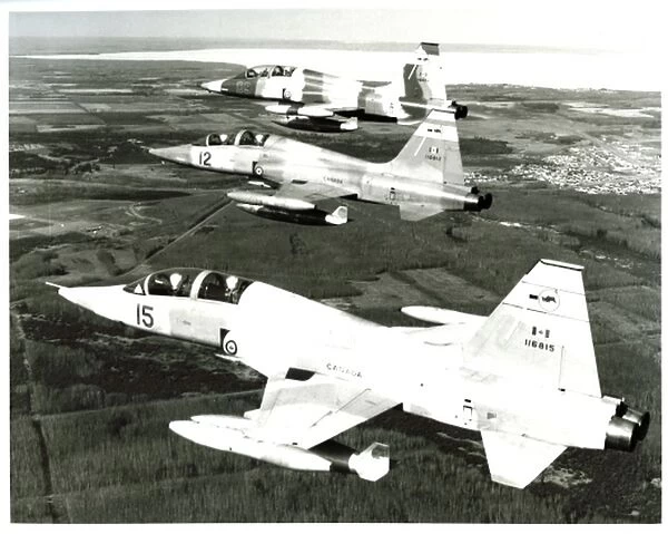 Formation of CF-5D freedom fighter aircraft from 419 Tactical Fighter Training Squadron Canada