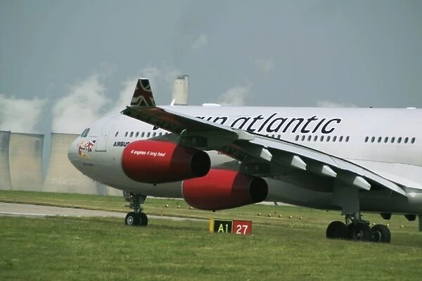 iml-527. Virgin A340-300 G-VELD, taxing to end of runway at EMA