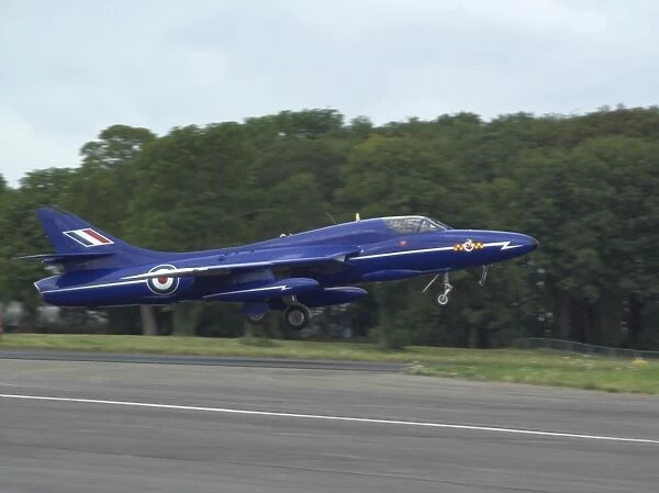 iml-615. Blue Hunter taking off fromDelta Jet hq, Kemble airfield Gloucs