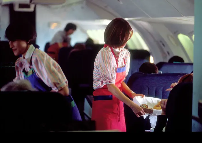 Framed Print : Interiors: Cathay Pacific crew serving on Boeing 747-400 Framed Print : Interiors: Cathay Pacific crew serving on Boeing 747-400