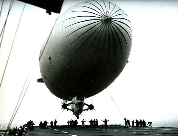 US Navy anti submarine Blimp airship being launched from an Aircraft Carrier