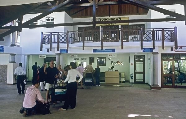 Passengers at check-in for domestic flight on Prasline Airport, Seychelles
