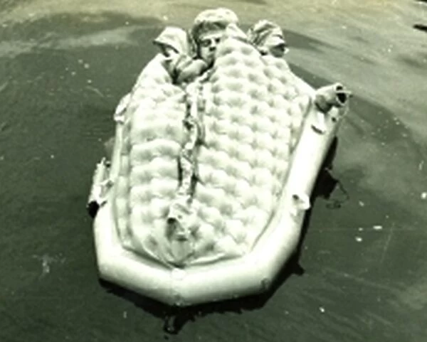 Personal survival floatation cocoon with pilot in the sea
