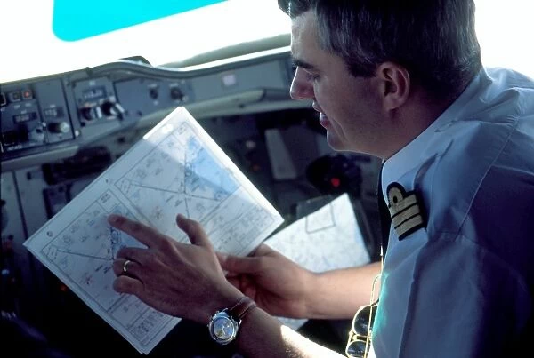 Pilot looking at map