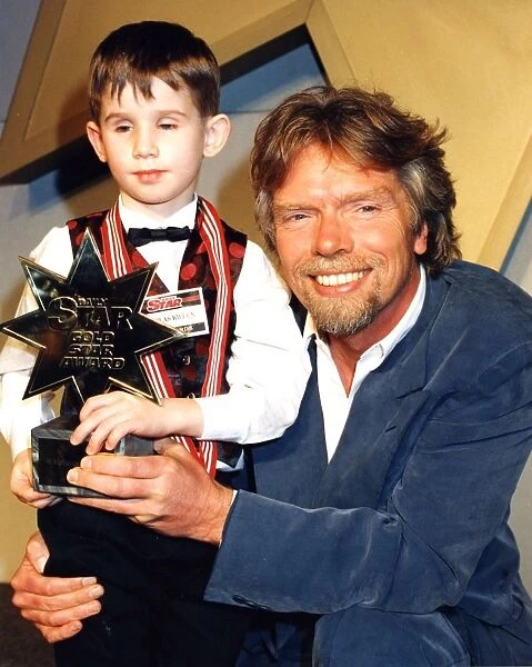 Richard Branson and Daily Star Gold award winner seven year old Nicholas Killen