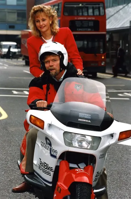 Framed Print : Richard Branson tries out his new motor cycle chauffeur service Framed Print : Richard Branson tries out his new motor cycle chauffeur service