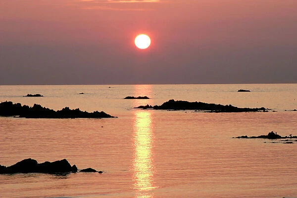 Sunset over Cobo Bay on Guernsey's north shore