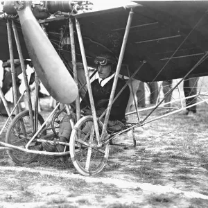 Print of Edmond Audemars sitting under his Demoiselle monoplane Print of Edmond Audemars sitting under his Demoiselle monoplane